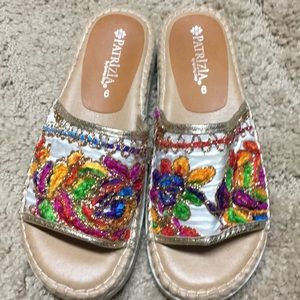 Gently used slip on sandals
